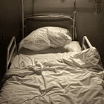 Empty Hospital Bed At A Nursing Facility