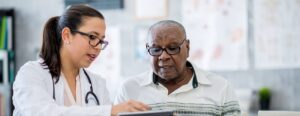 A female doctor with their patient